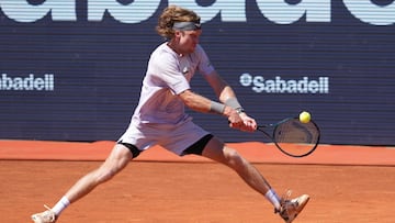 Russia's Andrey Rublev hits a return against Czech Republic's Tomas Machac during the ATP Barcelona Open "Conde de Godo" tennis tournament tennis match at the Real Club de Tenis in Barcelona, on April 17, 2026. (Photo by Manaure Quintero / AFP)