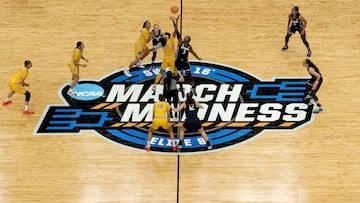 PORTLAND, OREGON - APRIL 01: Rayah Marshall #13 of the USC Trojans and Aaliyah Edwards #3 of the UConn Huskies reach for the opening tipoff in the Elite 8 round of the NCAA Women's Basketball Tournament at Moda Center on April 01, 2024 in Portland, Oregon.