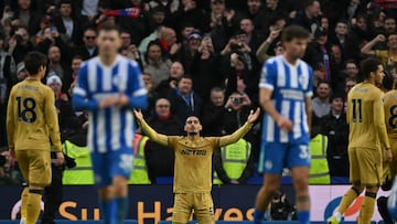 Crystal Palace's French defender #05 Maxence Lacroix (C) reacts to their win on the final whistle in the English Premier League football match between Brighton and Hove Albion and Crystal Palace at the American Express Community Stadium in Brighton, southern England on February 8, 2026. Palace won the game 1-0. (Photo by Glyn KIRK / AFP) / RESTRICTED TO EDITORIAL USE. No use with unauthorized audio, video, data, fixture lists, club/league logos or 'live' services. Online in-match use limited to 120 images. An additional 40 images may be used in extra time. No video emulation. Social media in-match use limited to 120 images. An additional 40 images may be used in extra time. No use in betting publications, games or single club/league/player publications. /