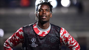 (FILES) This file photo taken on November 02, 2021 shows Manchester United&#039;s France&#039;s midfielder Paul Pogba warming up ahead of the UEFA Champions League group F football match between Atalanta and Manchester United at the Azzurri d&#039;Italia stadium, in Bergamo. (Photo by Marco BERTORELLO / AFP)