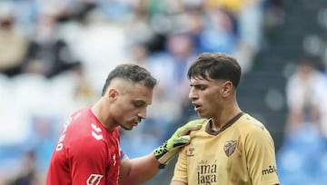 Alfonso Herrero, el capitán, con Izan Merino.