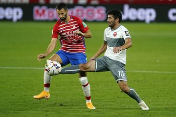 Maxime Gonalons e Irakli Sikharulidze.