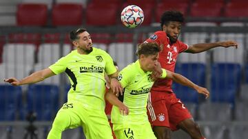 Soccer Football - Champions League - Group A - Bayern Munich v Atletico Madrid - Allianz Arena, Munich, Germany - October 21, 2020 Atletico Madrid's Marcos Llorente in action with Bayern Munich's Kingsley Coman REUTERS/Andreas Gebert