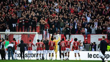 Nice's players celebrate their victory after winning the French L1 football match between OGC Nice and Stade de Reims at the Allianz Riviera Stadium in Nice, south-eastern France, on December 10, 2023. (Photo by Valery HACHE / AFP)