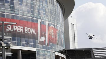 A helicopter flies over NRG Stadium for the NFL Super Bowl 51 football game Wednesday, Feb. 1, 2017, in Houston. (AP Photo/Morry Gash)