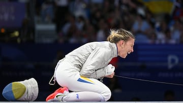 Ukraine's Olga Kharlan celebrates after winning against South Korea's Choi Se-bin in the women's sabre individual bronze medal bout during the Paris 2024 Olympic Games at the Grand Palais in Paris, on July 29, 2024. (Photo by Fabrice COFFRINI / AFP)