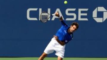 López, en la red, y Granollers, al saque.