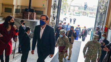 Handout picture released by the Peruvian Presidency showing President Martin Vizcarra arriving to give a statement in Congress where he is facing an impeachment trial, in Lima on September 18, 2020. - Vizcarra remained defiant Friday as Peru&#039;s congress began an impeachment debate ahead of a vote that analysts say he is expected to survive as his opponents in congress are likely to fall short of the votes needed to oust him. Vizcarra, in power since 2018, came under fire after leaked audio recordings in which he is heard telling aides to hide details from congressional investigators of his office&#039;s controversial hiring of a popular singer as a paid cultural advisor. (Photo by Andres VALLE / Peruvian Presidency / AFP) / RESTRICTED TO EDITORIAL USE - MANDATORY CREDIT &quot;AFP PHOTO / PERUVIAN PRESIDENCY / ANDRES VALLE&quot; - NO MARKETING - NO ADVERTISING CAMPAIGNS - DISTRIBUTED AS A SERVICE TO CLIENTS