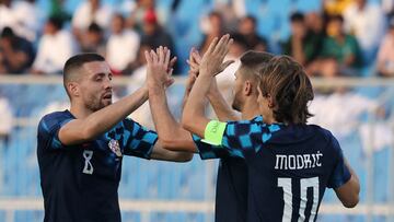 Soccer Football - International Friendly - Saudi Arabia v Croatia - Prince Faisal bin Fahd Stadium, Riyadh, Saudi Arabia - November 16, 2022 Croatia's Andrej Kramaric celebrates scoring their first goal with Luka Modric and Mateo Kovacic REUTERS/Ahmed Yosri