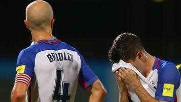 COUVA, TRINIDAD AND TOBAGO - OCTOBER 10: Michael Bradley (L) and Christian Pulisic (R) of the United States mens national team react to their loss against Trinidad and Tobago during the FIFA World Cup Qualifier match between Trinidad and Tobago at the Ato Boldon Stadium on October 10, 2017 in Couva, Trinidad And Tobago. Ashley Allen/Getty Images/AFP
== FOR NEWSPAPERS, INTERNET, TELCOS & TELEVISION USE ONLY ==