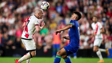 MADRID, SPAIN - OCTOBER 14: Isaac Palazon of Rayo Vallecano battle for the ball with Carles Alena of Getafe CF  during the LaLiga Santander match between Rayo Vallecano and Getafe CF at Campo de Futbol de Vallecas on October 14, 2022 in Madrid, Spain. (Photo by Diego Souto/Quality Sport Images/Getty Images)
