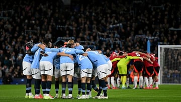 Jugadores del Manchester City y del Manchester United.