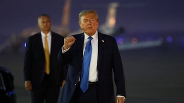 U.S. President Donald Trump gestures after returning early from the G7 Leaders' Summit in Canada, at Joint Base Andrews, Maryland, U.S., June 17, 2025. REUTERS/Kevin Lamarque TPX IMAGES OF THE DAY