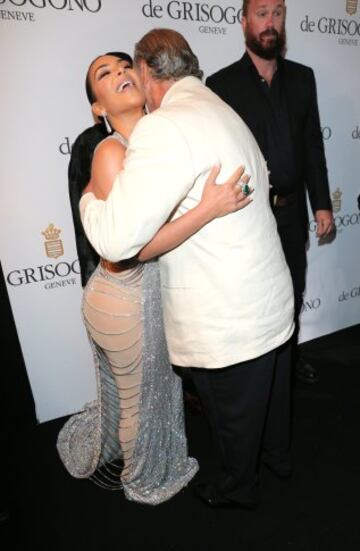 Fawaz Gruosi y Kim Kardashian durante la fiesta 'De Grisogono'.