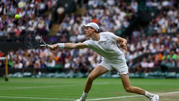 Tennis - Wimbledon - All England Lawn Tennis and Croquet Club, London, Britain - July 7, 2024 Italy's Jannik Sinner in action during his fourth round match against Ben Shelton of the U.S. REUTERS/Hannah Mckay