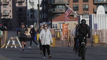 LONG BEACH, NEW YORK - MAY 21: Visitors take to the boardwalk as it reopened in the early morning hours on May 21, 2020 in Long Beach, New York. City officials had closed the boardwalk on March 26 over worries of overcrowding on the city's 2.2-mile beachfront walkway during the COVID-19 pandemic. Bruce Bennett/Getty Images/AFP
== FOR NEWSPAPERS, INTERNET, TELCOS & TELEVISION USE ONLY ==