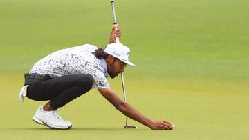 HOUSTON, TEXAS - MARCH 31: Akshay Bhatia of the United States lines up a putt on the fourth green during the final round of the Texas Children's Houston Open at Memorial Park Golf Course on March 31, 2024 in Houston, Texas.