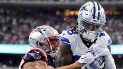 ARLINGTON, TEXAS - OCTOBER 01: CeeDee Lamb #88 of the Dallas Cowboys catches a touchdown over Myles Bryant #27 of the New England Patriots during the first quarter at AT&T Stadium on October 01, 2023 in Arlington, Texas.   Sam Hodde/Getty Images/AFP (Photo by Sam Hodde / GETTY IMAGES NORTH AMERICA / Getty Images via AFP)