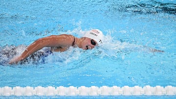 US' Katie Ledecky competes in a heat of the women's 1500m freestyle swimming event during the Paris 2024 Olympic Games at the Paris La Defense Arena in Nanterre, west of Paris, on July 30, 2024. (Photo by Manan VATSYAYANA / AFP)