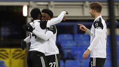 14 February 2021, United Kingdom, Liverpool: Fulham&#039;s Josh Maja celebrates scoring his side&#039;s first goal with teammates during the English Premier League soccer match between Everton and Fulham at Goodison Park. Photo: Jason Cairnduff/PA Wire/dp