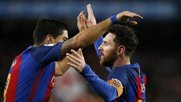 Football Soccer - Barcelona v Atletico Madrid- Spanish King's Cup Semi-final second leg - Camp Nou Stadium, Barcelona, Spain - 07/02/17 Barcelona's Luis Suarez celebrates with Lionel Messi after scoring their first goal. REUTERS/Albert Gea
