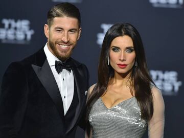 Real Madrid and Spain&#039;s defender Sergio Ramos and his wife, Spanish TV presenter Pilar Rubio pose as they arrive for The Best FIFA Football Awards 2016 ceremony, on January 9, 2017 in Zurich. / AFP PHOTO / MICHAEL BUHOLZER