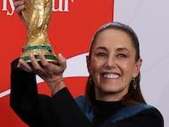 Mexico's President Claudia Sheinbaum lifts the FIFA World Cup trophy during her morning press conference at the National Palace, in Mexico City, Mexico, March 3, 2026. REUTERS/Stringer