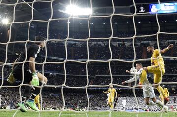 Medhi Benatia of Juventus fouls Lucas Vazquez of Real Madrid, leading to a penalty being awarded during the UEFA Champions League Quarter Final Second Leg match between Real Madrid and Juventus.