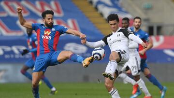 Crystal Palace's English midfielder Andros Townsend (L) vies with Fulham's English-born US defender Antonee Robinson during the English Premier League football match between Crystal Palace and Fulham at Selhurst Park in south London on Febraury