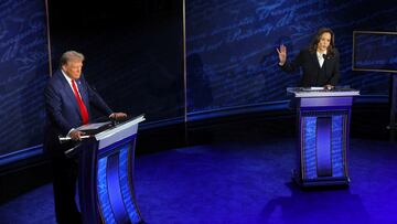 Democratic presidential nominee, U.S. Vice President Kamala Harris speaks during a presidential debate hosted by ABC as Republican presidential nominee, former U.S. President Donald Trump listens, in Philadelphia, Pennsylvania, U.S., September 10, 2024. REUTERS/Brian Snyder TPX IMAGES OF THE DAY