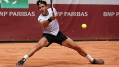 Argentina's Tomas Martin Etcheverry plays a forehand return against France's Ugo Humbert during the final of the ATP Tour Bordeaux tennis tournament in Bordeaux, southwestern France, on May 20, 2023. (Photo by ROMAIN PERROCHEAU / AFP)