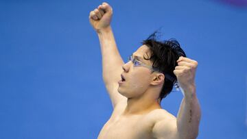 China's Qin Haiyang celebrates after victory in the final of the men's 200m breaststroke swimming event during the World Aquatics Championships in Fukuoka on July 28, 2023. (Photo by Fran�ois-Xavier MARIT / AFP)