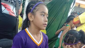 Rhea Bullos, con sus particulares 'Nike' durante una competición.