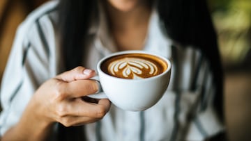 Portrait asian woman smiling relax in coffee shop cafe