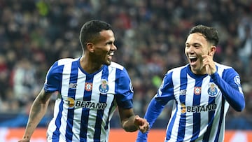 FC Porto's Brazilian forward Galeno (L) celebrates after scoring a goal with FC Porto's Brazilian forward Pepe Cossa during the UEFA Champions League Group B football match between Bayer 04 Leverkusen and FC Porto in Leverkusen, western Germany, on October 12, 2022. (Photo by INA FASSBENDER / AFP)