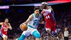 Mar 1, 2024; Philadelphia, Pennsylvania, USA; Charlotte Hornets Vasa Micic (22) drives against Philadelphia 76ers forward Paul Reed (44) during the third quarter at Wells Fargo Center. Mandatory Credit: Bill Streicher-USA TODAY Sports