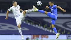 MEXICO CITY, MEXICO - NOVEMBER 21: Celso Ortiz of Monterrey fights for the ball with Victor Yotun of Cruz Azul during the repechage match between Cruz Azul and Monterrey as part of the Torneo Grita Mexico A21 Liga MX at Azteca Stadium on November 21, 2021