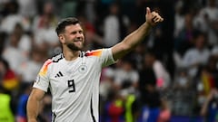 Germany's forward #09 Niclas Fullkrug celebrates after the UEFA Euro 2024 Group A football match between Switzerland and Germany at the Frankfurt Arena in Frankfurt am Main on June 23, 2024. (Photo by Tobias SCHWARZ / AFP)