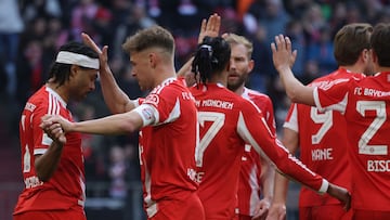 Bayern Munich's German forward #07 Serge Gnabry (L) celebrates his 4-0 with Bayern Munich's German midfielder #06 Joshua Kimmich (2nd L) during the German first division Bundesliga football match between FC Bayern Munich and Union Berlin in Munich, southern Germany, on March 21, 2026. (Photo by Karl-Josef HILDENBRAND / AFP) / DFL REGULATIONS PROHIBIT ANY USE OF PHOTOGRAPHS AS IMAGE SEQUENCES AND/OR QUASI-VIDEO
