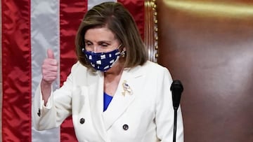 U.S. Speaker of the House Nancy Pelosi (D-CA) gives a thumbs up ahead of the final passage in the House of Representatives of U.S. President Joe Biden's $1.9 trillion coronavirus disease (COVID-19) relief bill inside the House Chamber of the Capitol