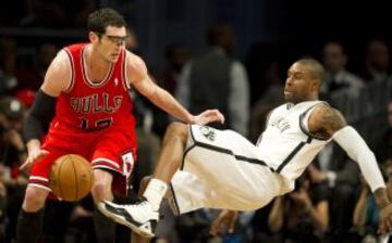 Kirk Hinrich y C.J. Watson.