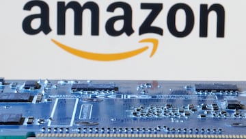 Amazon logo is seen near computer motherboard in this illustration taken January 8, 2024. REUTERS/Dado Ruvic/Illustration