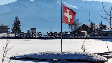 A Swiss flag flutters at half-mast, after a deadly fire and explosion during a New Year's Eve party, in the upscale ski resort of Crans-Montana in southwestern Switzerland, January 7, 2026. REUTERS/Umit Bektas