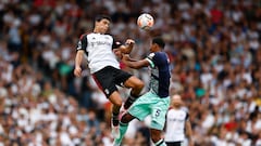 Soccer Football - Premier League - Fulham v Brentford - Craven Cottage, London, Britain - August 19, 2023  Fulham's Raul Jimenez in action with Brentford's Ethan Pinnock REUTERS/Peter Nicholls EDITORIAL USE ONLY. No use with unauthorized audio, video, data, fixture lists, club/league logos or 'live' services. Online in-match use limited to 75 images, no video emulation. No use in betting, games or single club /league/player publications.  Please contact your account representative for further details.