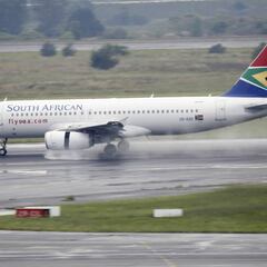 When will South Africa open borders and resume international flights?