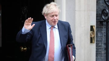 FILE PHOTO: Britain's Prime Minister Boris Johnson waves as he leaves Downing Street, as the spread of coronavirus disease (COVID-19) continues. London, Britain, March 25, 2020. REUTERS/Hannah Mckay/File Photo