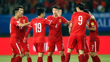China's players celebrate their goal against the Maldives during a 2018 World Cup football qualifying match in Wuhan, central China's Hubei province.