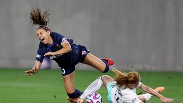 Sep 16, 2023; San Diego, California, USA; San Diego Wave FC forward Alex Morgan (13) and Kansas City Current defender Stine Ballisager Pederson (12) collide in the first half at Snapdragon Stadium. Mandatory Credit: Abe Arredondo-USA TODAY Sports