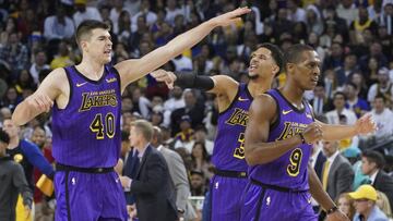 December 25, 2018; Oakland, CA, USA; Los Angeles Lakers center Ivica Zubac (40), guard Josh Hart (3), and guard Rajon Rondo (9) celebrate during the fourth quarter against the Golden State Warriors at Oracle Arena. Mandatory Credit: Kyle Terada-USA TODAY Sports