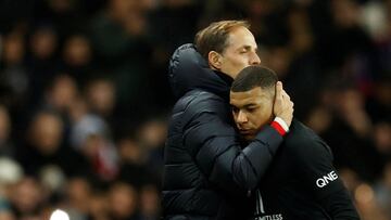 Soccer Football - Ligue 1 - Paris St Germain v Montpellier - Parc des Princes, Paris, France - February 1, 2020 Paris St Germain's Kylian Mbappe embraces coach Thomas Tuchel after he comes off as a substitute REUTERS/Gonzalo Fuentes